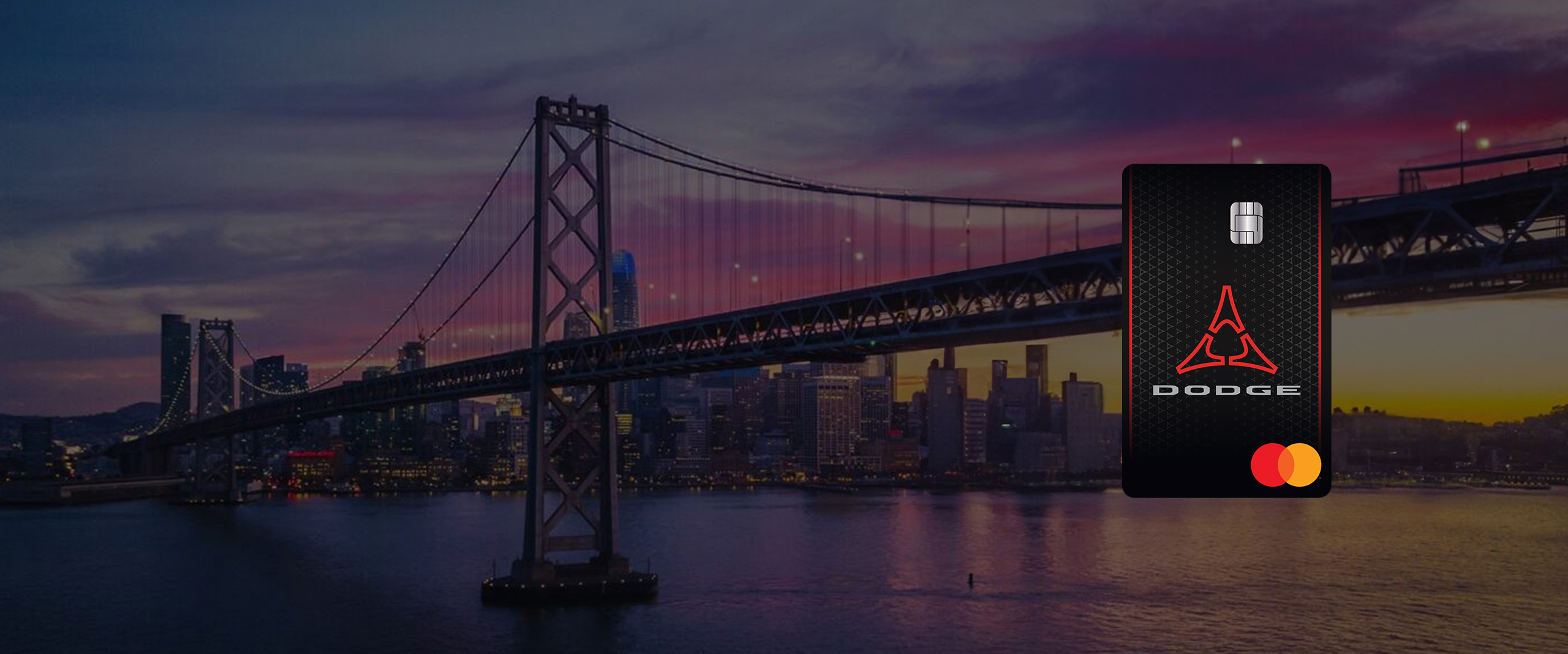 Mopar-branded Mastercard superimposed on a vista of a winding mountain road.