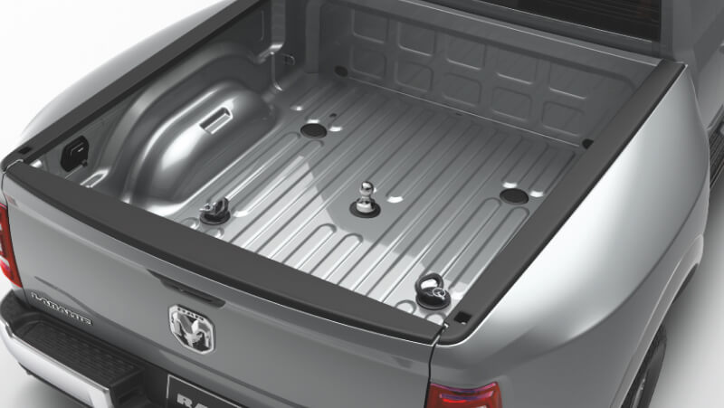 Close-up of gooseneck hitch inside Ram 2500/3500 HD Laramie in Billet Silver Metallic